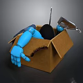 Brown Cardboard Box Containing Blue Robotic Arm Metal Tool And Black Object