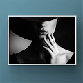 Black and White Woman Portrait Painting With Wide Brimmed Hat Lips and Hand on Blue Wall
