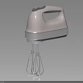 Sleek Pink Hand Mixer With Metallic Silver Accents And Whisk Attachments