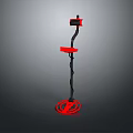 Red And Black Metal Detector With Circular Base And Detection Coil