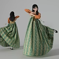 Woman Wearing Traditional Green Beige Patterned Dress With Orange Sleeves Dancing With Flowing Skirt