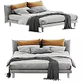 Modern Upholstered Double Bed With Orange Grey Pillows And Throw Blanket 3d model