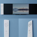 Modern Wall Mounted TV Displaying Scenic Landscape With Side Speaker Panels