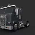 Dark Heavy Duty Semi Truck With Silver Roof Metal Grille And Large Wheels