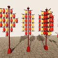 Outdoor Art Installation Featuring Red Lanterns Arranged On Tall Structures With Stone Pavement 3d model