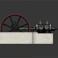 Industrial Mechanical Equipment With Red Wheel Black Body And Base Blocks
