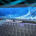 Banquet Hall With Large LED Screen Dynamic Blue Light Effects And Stage Audience Seats