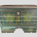 Vintage Wooden Storage Cabinet With Green Finish And Floral Painted Patterns