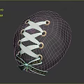 Black Stone Sculpture With White Lacing Golden Rings Crisscross Design And Text Label