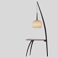Modern Floor Lamp With Curved Black Stand And Beige Round Lampshade Design