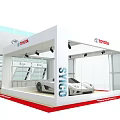 Toyota Exhibition Booth Display With White Structure Glass Walls Lighting And Sports Car