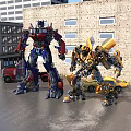 Transformers Characters Optimus Prime Bumblebee And Small Robot In City Scene