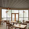 Modern Restaurant Interior With Gray Ceiling Wooden Tables Pendant Lights Large Windows Green Plants