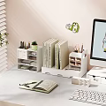 Organized Study Room Interior With Desk Books Notebook Pens Plant And Computer Monitor