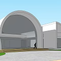 Modern Office Building Exterior With Curved Roof Glass Elements Lawn And Walkway