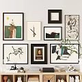 Interior Wall Artwork Collection With Different Frames And Decorative Items On Table 3d model