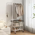 Modern Clothes Rack With Neutral Coats Basket Folded Clothes And VOGUE Poster