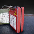 Green And Red Worn Fuel Cans With Warning Symbols And Labels