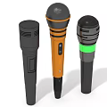 Three Various Design Microphones With Orange Black And Green Color Accents