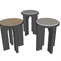 Modern Black Side Tables With Arched Legs And Round Textured Tops