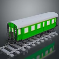 Green and White Model Train Carriage on Detailed Railway Track