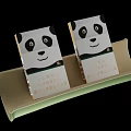 Two Stylish Panda Design Cigarette Packs Displayed in Green Tray