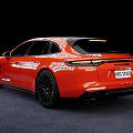 Red Luxury Sports Estate Car With Sleek Body And Black Alloy Wheels