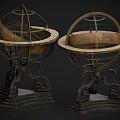 Antique Brass Armillary Globes With Intricate Metal Stands And Ornate Bases