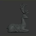 Gray Reclining Deer Sculpture With Ornate Antlers And Decorative Patterns
