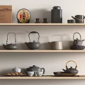 Elegant Tea Sets Arranged on Wooden Shelves with Teapots Teacups and Tea Cakes