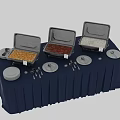 Assorted Foods On Buffet Table With Blue Tablecloth Chafing Dishes White Plates And Utensils
