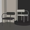 Modern Single Chair Featuring Black and White Cylindrical Backrest Metal Frame in Minimalist Setting