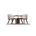 Two Beige Leisure Chairs with Small Round Table Wooden Legs on Light Colored Circular Rug