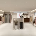Modern Clothing Store Interior With Displayed Clothes Mannequins And Clothing Racks