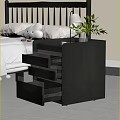 Sleek Black Nightstand With Drawers Featuring White Lamp Green Plants In Vase And Cup