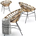 Stylish Rattan Leisure Chairs With Black Metal Legs Gray Geometric Pattern Blanket And Fringe Detail