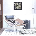 Modern Leisure Chair With Black Leather Cushion Wooden Frame On Patterned Rug Near Wall Art