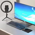 Modern Computer Workstation With Monitor Keyboard Mouse Ring Light Microphone On White Desk