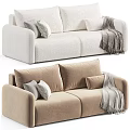 Light Beige Two Seater Sofa With Soft Upholstery Decorative Pillows And Cozy Throw Blanket