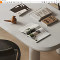 Open Coffee Themed Magazines And Books With Interior Design Pages And Wooden Bird Decor