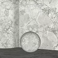 Marble Sphere Decorative Element On Countertop With Marble Wall And Lighting