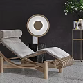 Modern Rattan Lounge Chair With Wooden Frame Gold Side Table And Green Plant