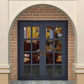 Double Doors With Glass Panes In Arched Frame Against Brick Wall Exterior