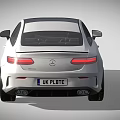 White Mercedes AMG Coupe with Black Roof and Sporty Black Wheels