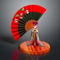 Red Fan With White Flowers Green Leaves Featuring Figurine In Traditional Attire On Wooden Base