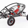 Open Frame Off Road Car With Black Chassis Red Seats And Large Wheels