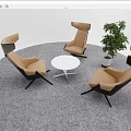 Modern Lounge Area With Brown Black Chairs White Round Table Green Plant And Gray Carpet