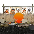 Outdoor Leisure Area With Food Posters Fence Orange Decor Chairs Dry Grass And Gravel Ground