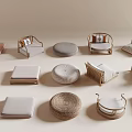 Various Shaped Home Cushions And Rattan Chairs With Neutral Colored Pads