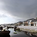 Traditional Wooden Boats on River with Ancient Buildings and Bridge Under Cloudy Sky